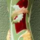 Slip vase, thistle motif, Art Nouveau