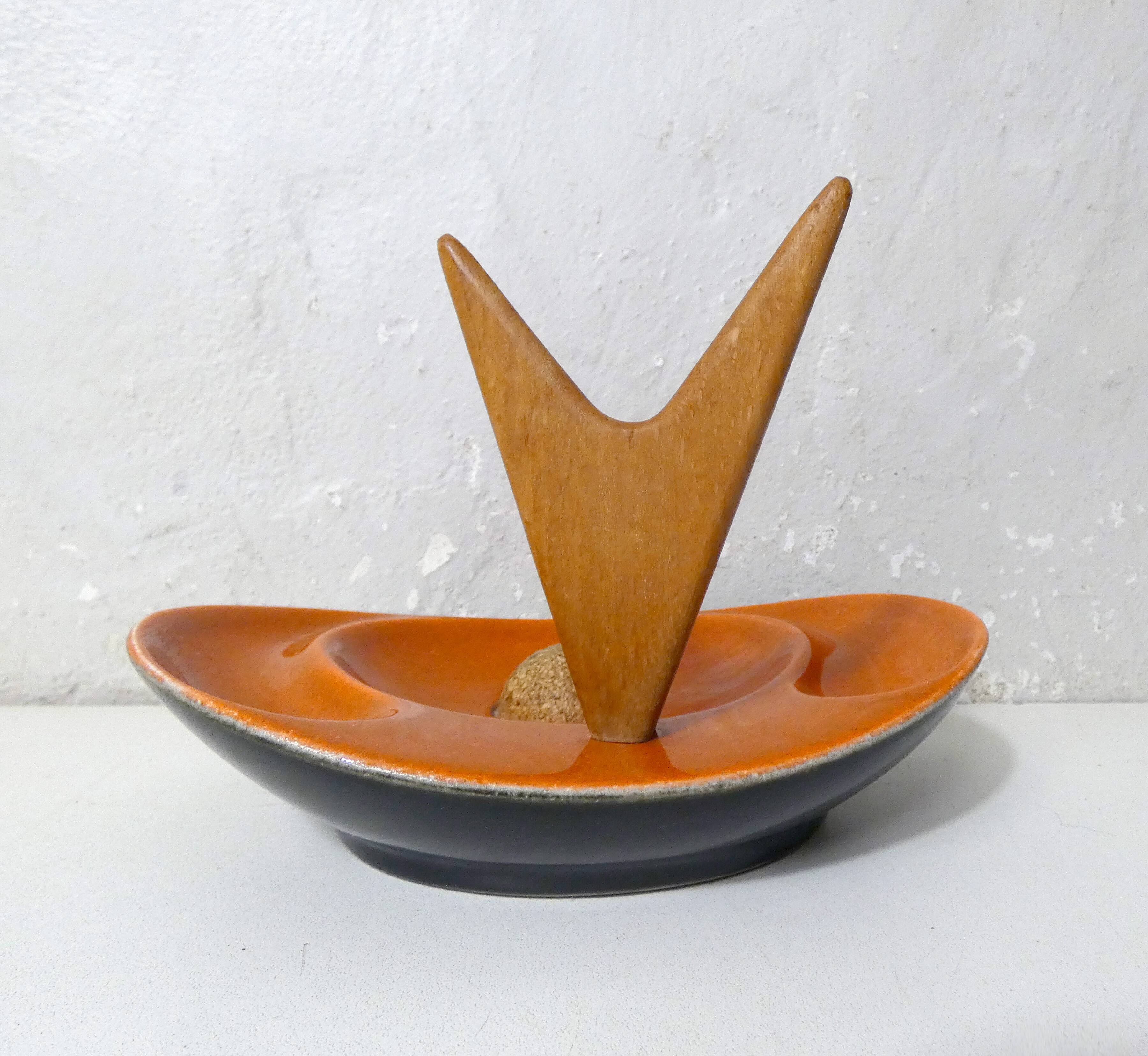 old ceramic and asymmetrical wood pipe ashtray