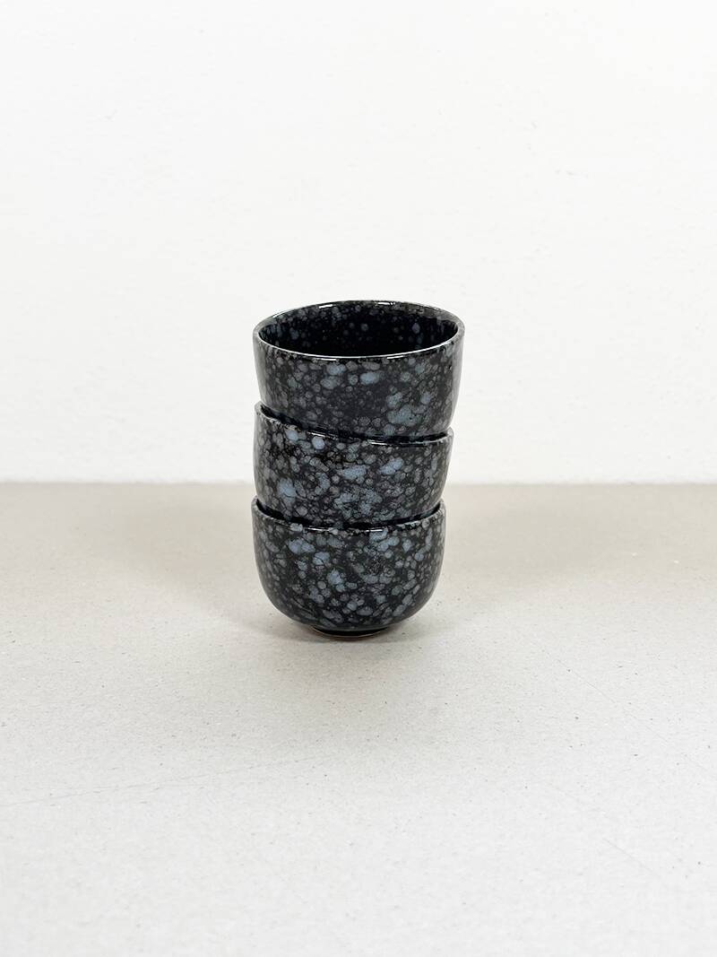 Black and gray ceramic mugs