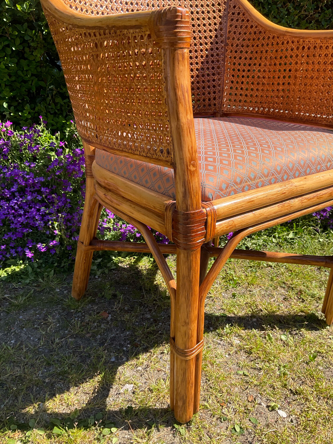 Mc Guire style armchair in rattan and caning from the 1980s.