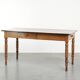 Antique French cherry wood dining table from the 19th century
