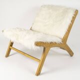 Pair of low chairs by olivier de schrijver