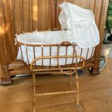 Bamboo, rattan, wicker cradle bassinet from the 1960s with a foldable support.