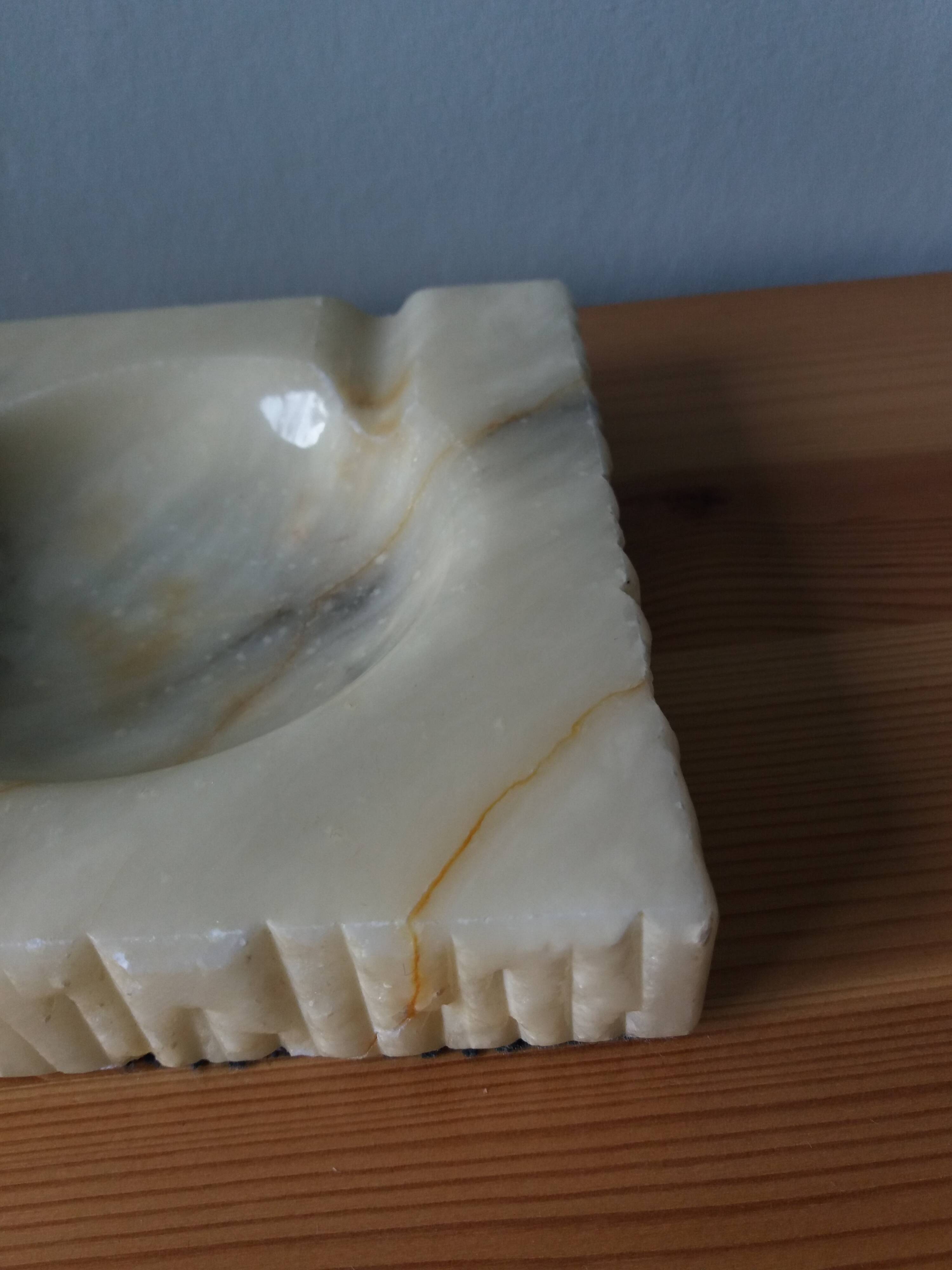 Marble or alabaster ashtray