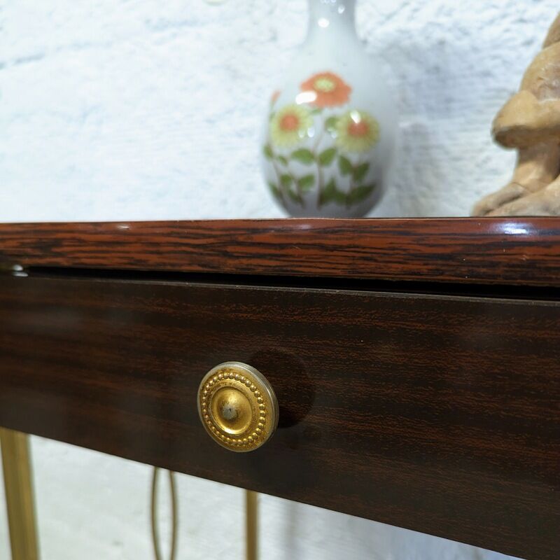 Vintage bedside table with wheels