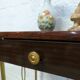 Vintage bedside table with wheels
