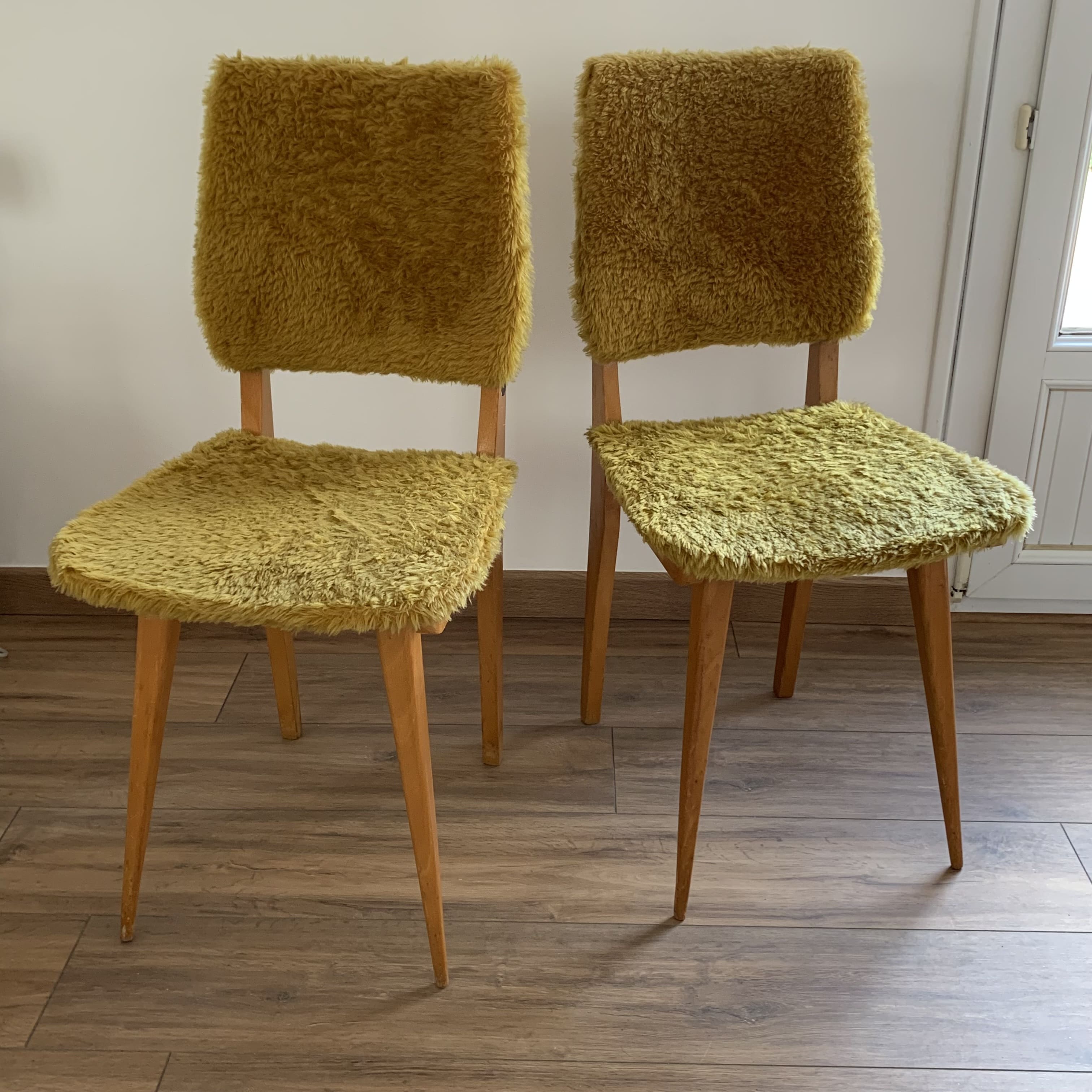 2 yellow moumoute chairs