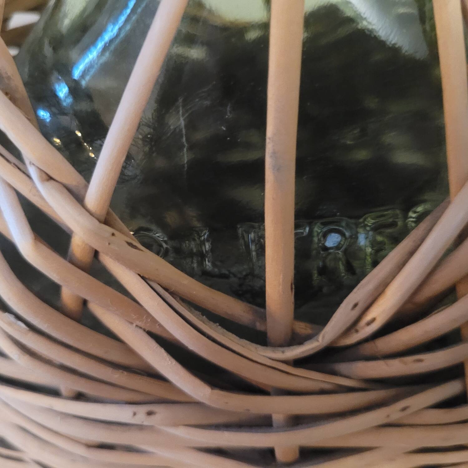 Green glass carafe with wicker covering – 2 litres – 1960s–1970s