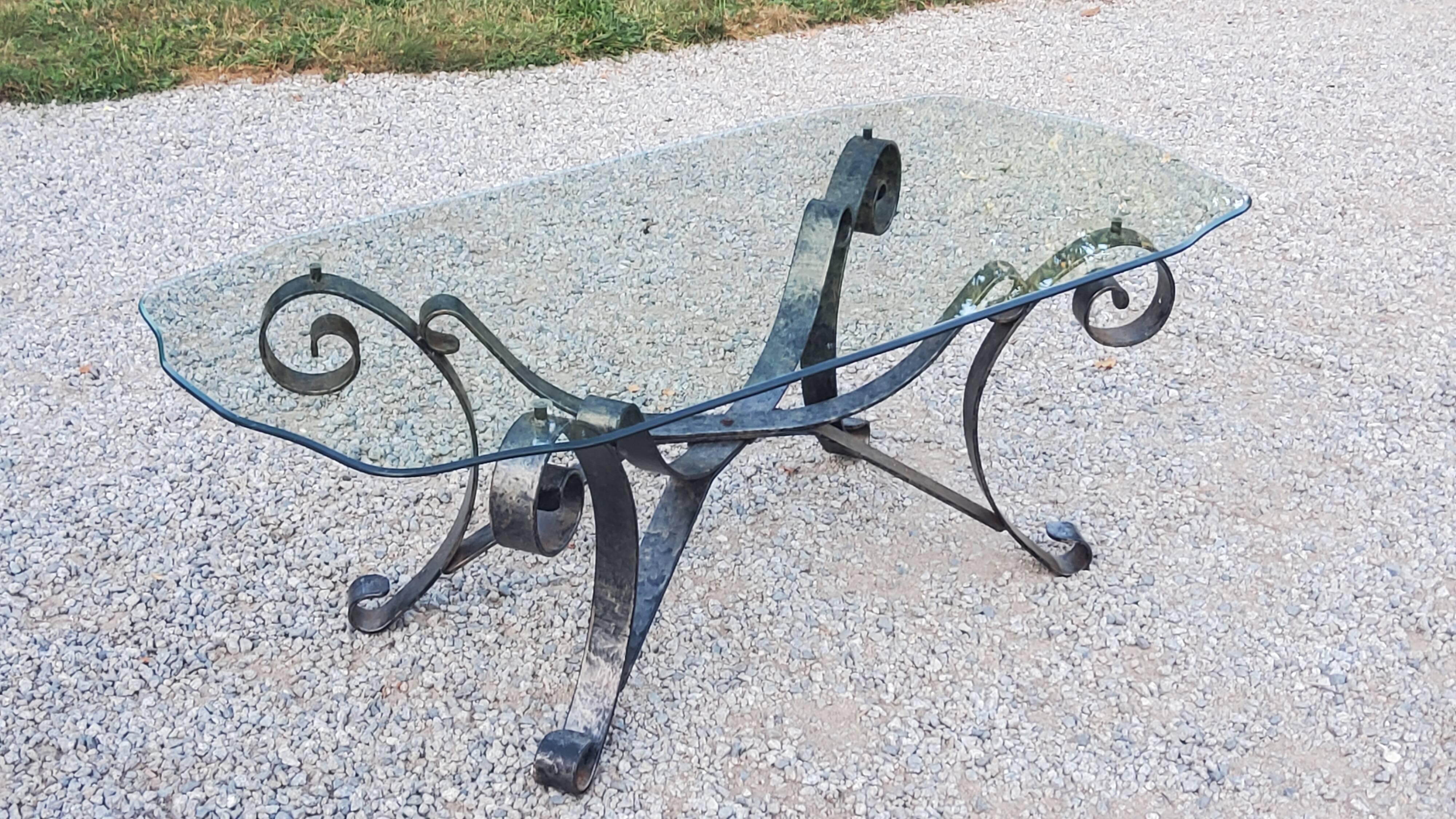 Coffee table from the 70s in wrought iron glass top bec de corbin