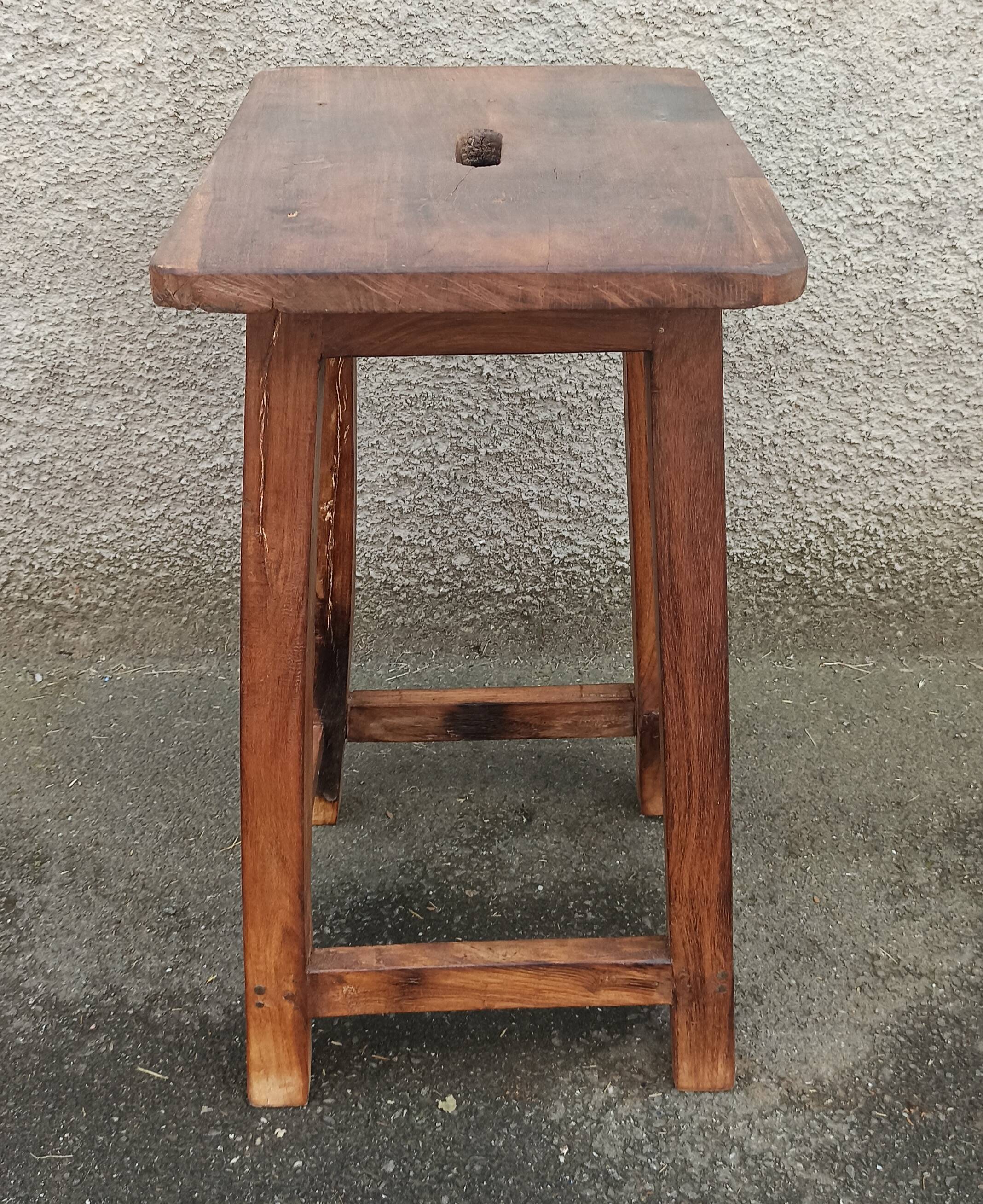 Old wooden high stool