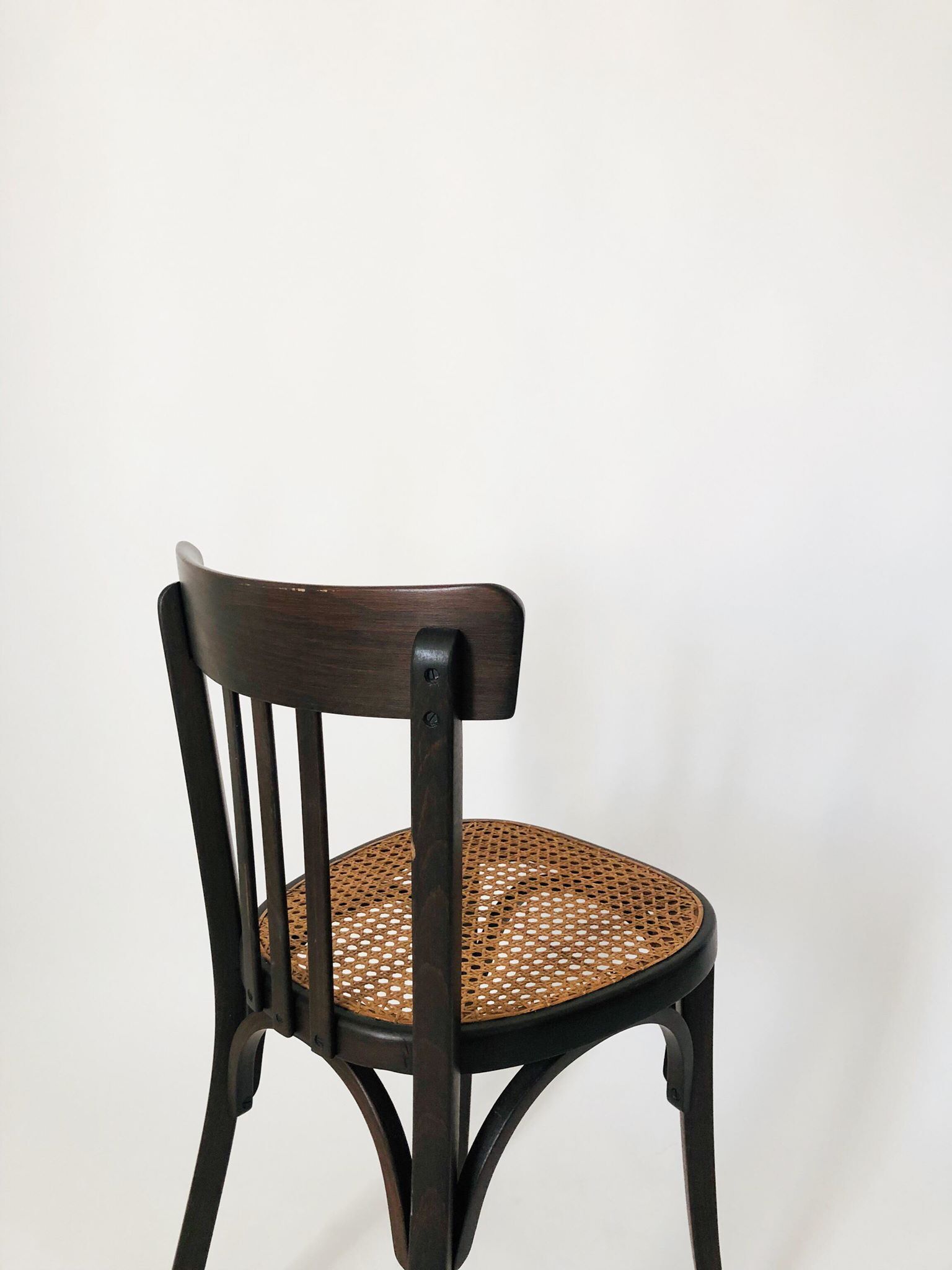 Chaise bistro cannage signée Baumann