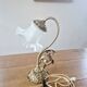 Art Nouveau bedside lamp in bronze with a tulip shape.