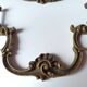 Antique pair of bronze drawer handles.