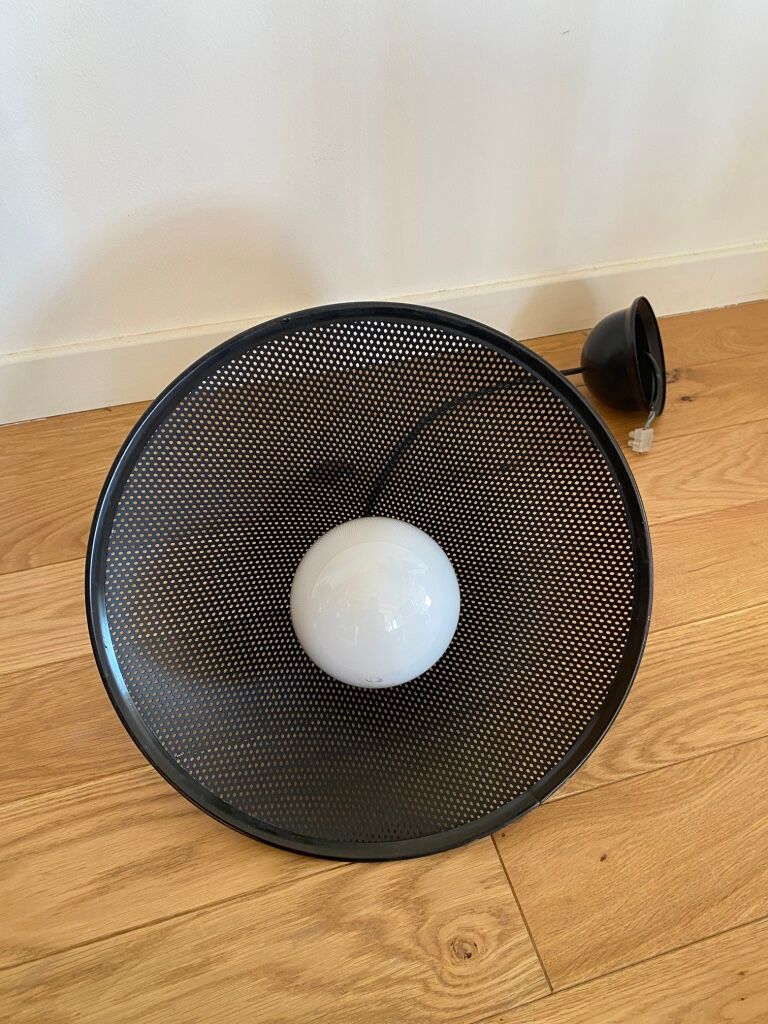 Black perforated metal suspension