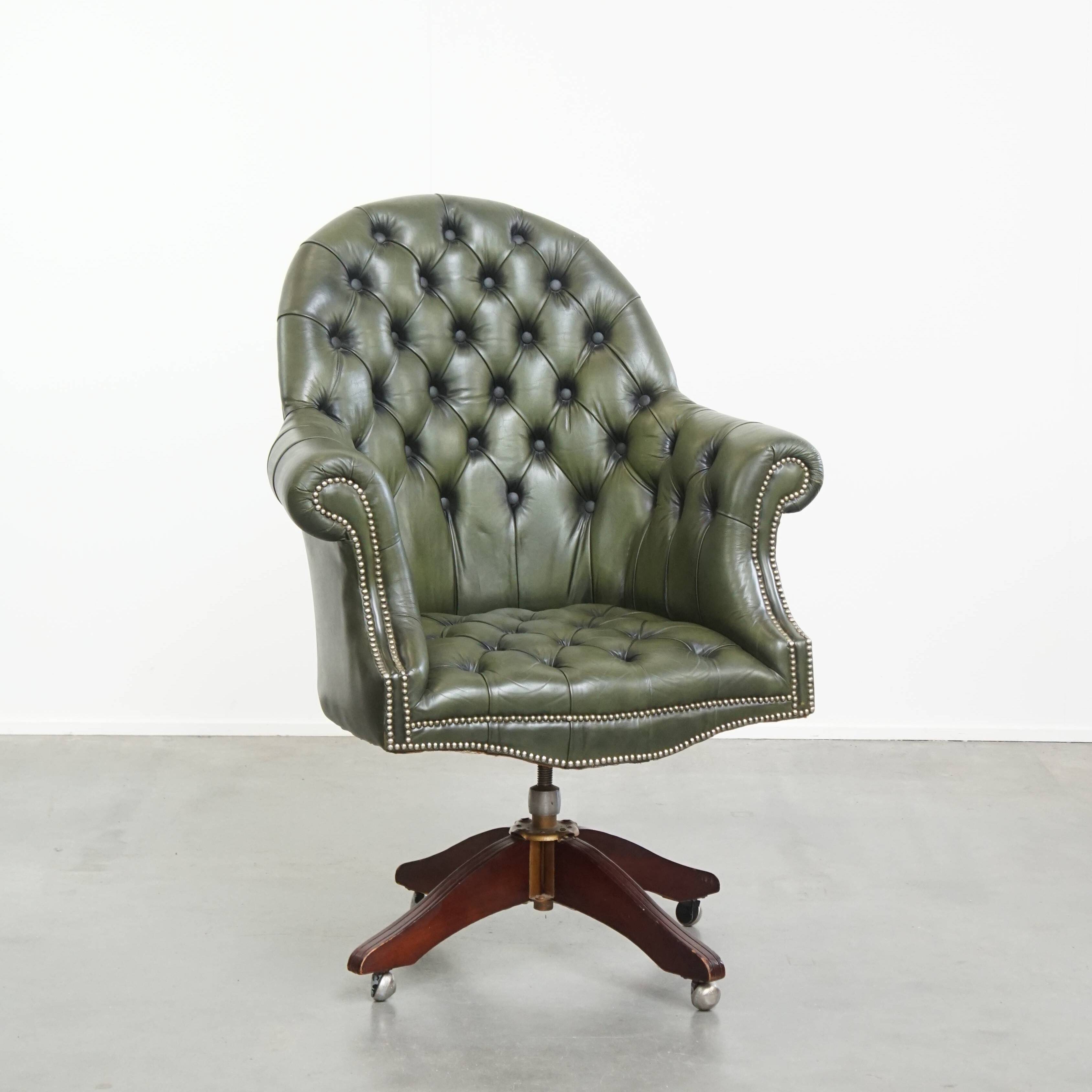 Chesterfield office chair in green cowhide leather on casters with high back