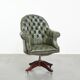 Chesterfield office chair in green cowhide leather on casters with high back