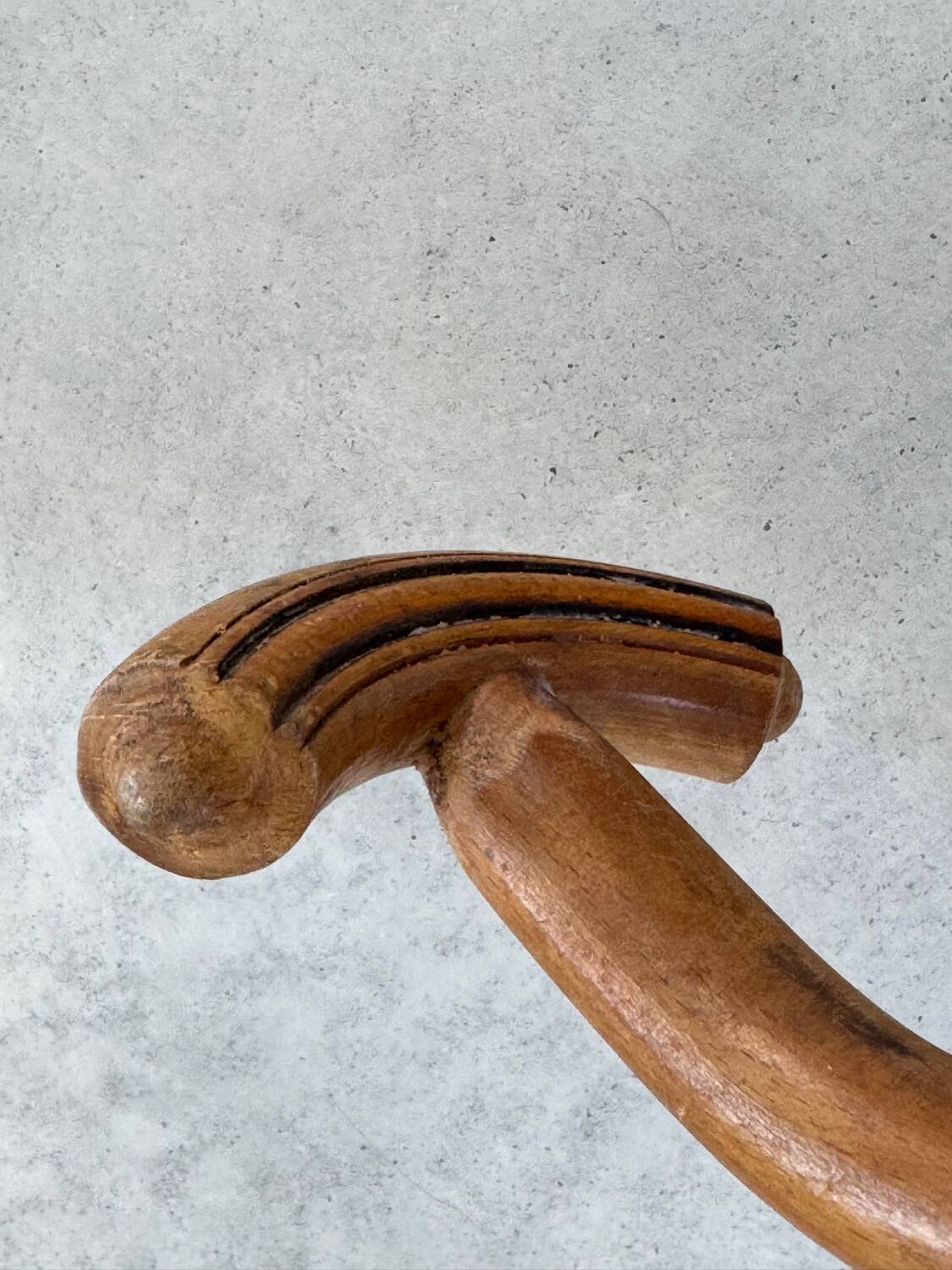 Pair of curved wooden coat racks or hooks from the 1900s