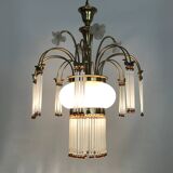 Art Nouveau style chandelier in brass with pendants and glass globe with 3 lights. Italy 70s 80s
