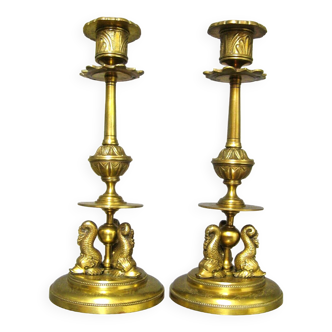 Pair of candlesticks in chiseled brass, nineteenth century.