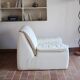 Cinna armchair in cream leather, bolstered armrests, 1970s.