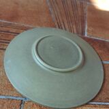 A pair of vintage glazed stoneware cups and saucers.