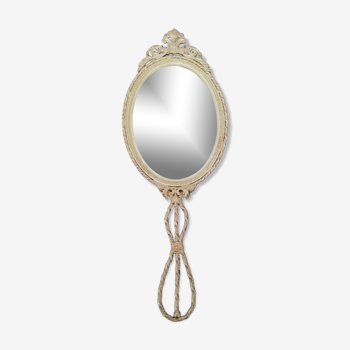 Bevelled hand or hanging mirror in gilded brass