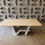 Rectangle travertine table with geometric foot