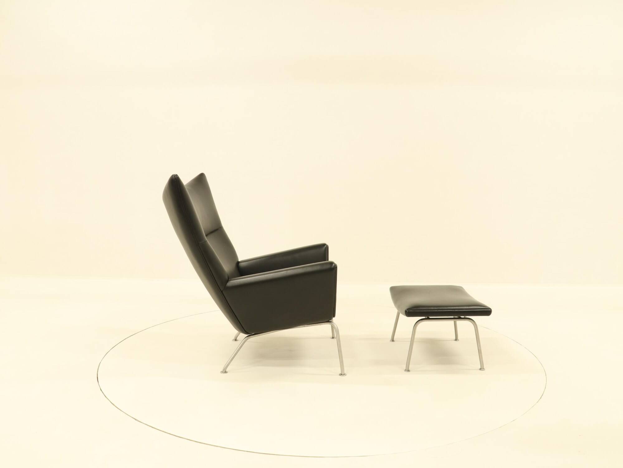 Wing chair & matching ottoman – CH445 & CH446 – by Hans Wegner