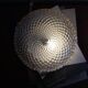 Amber glass wall light or ceiling light with a diamond tip.