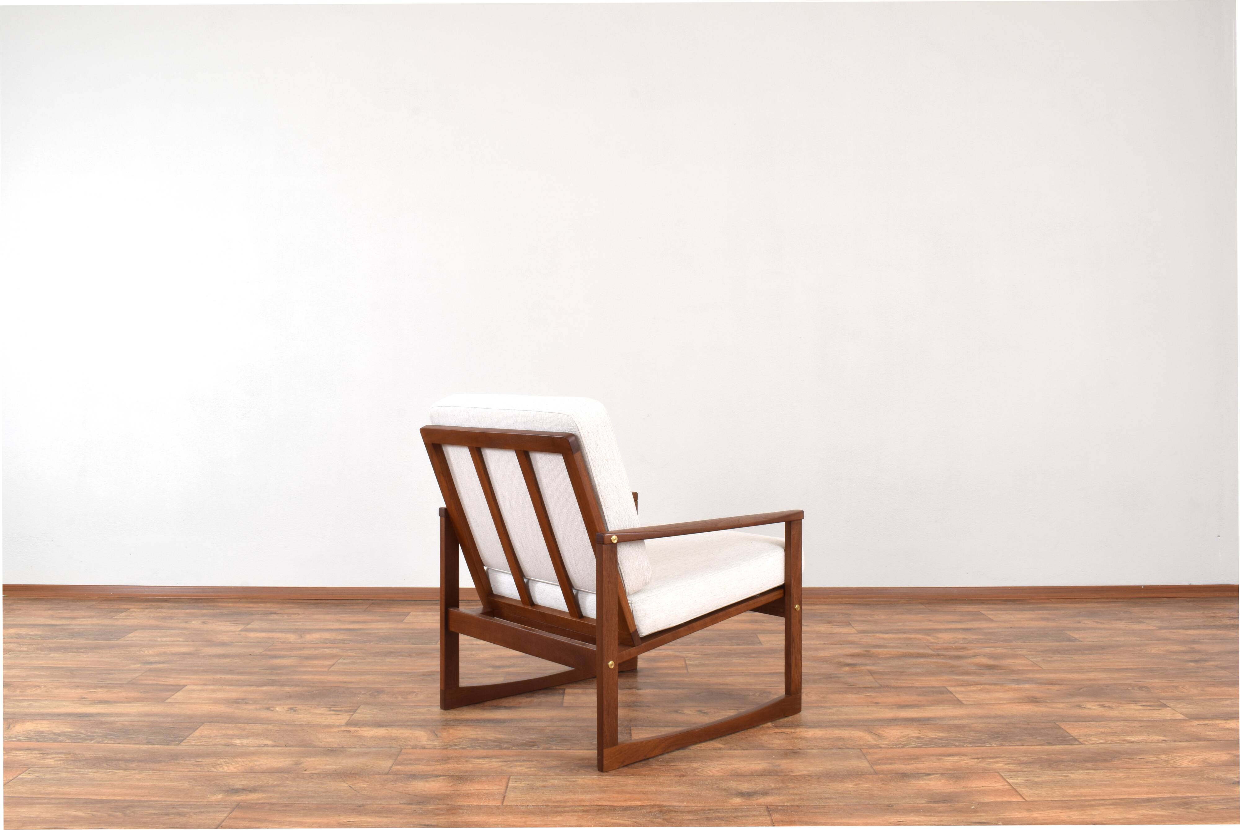 Lounge chair by Juul Kristensen and danich teak lounge chair, set of 2