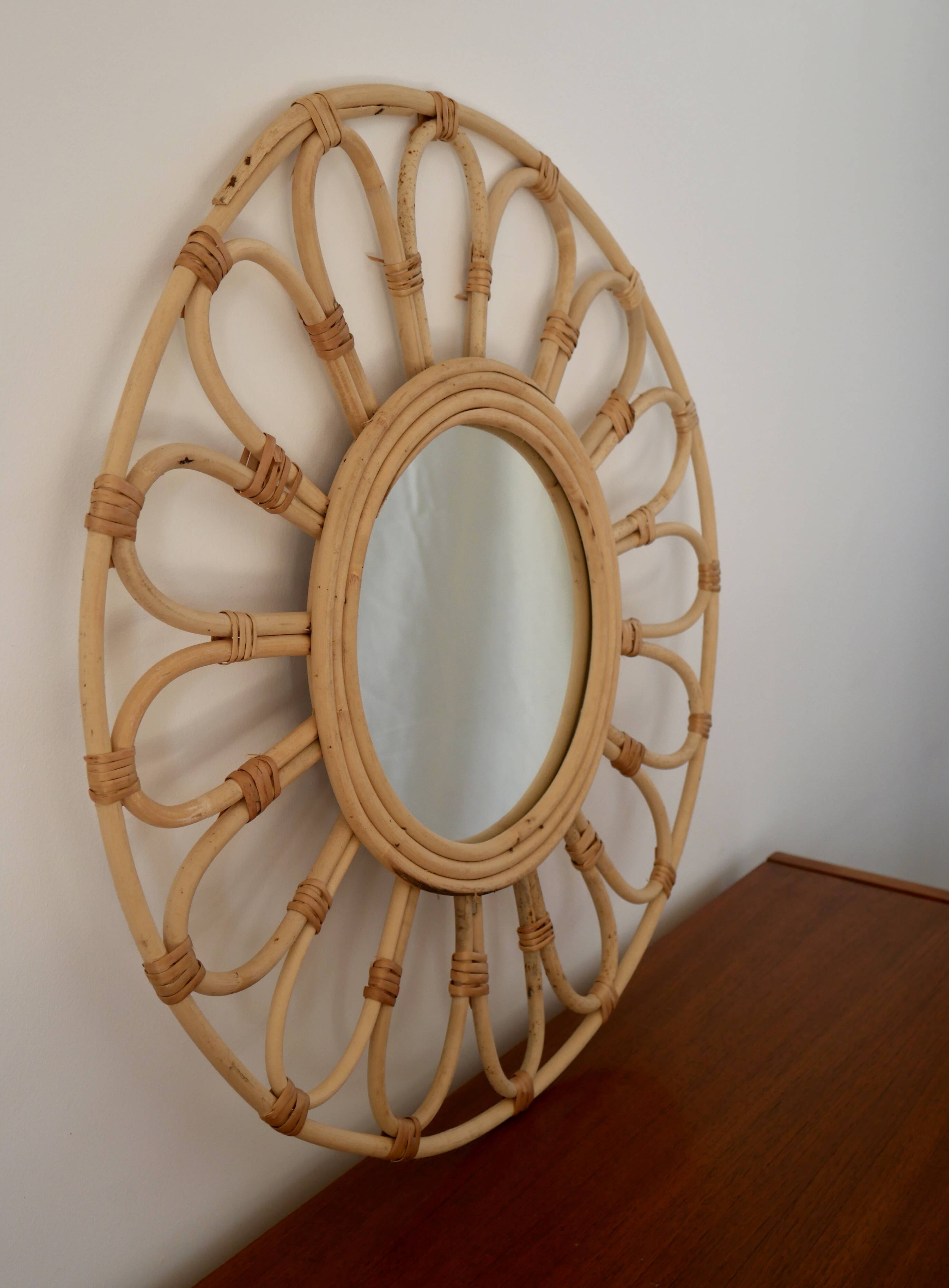 Vintage rattan and bamboo sun mirror