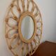 Vintage rattan and bamboo sun mirror