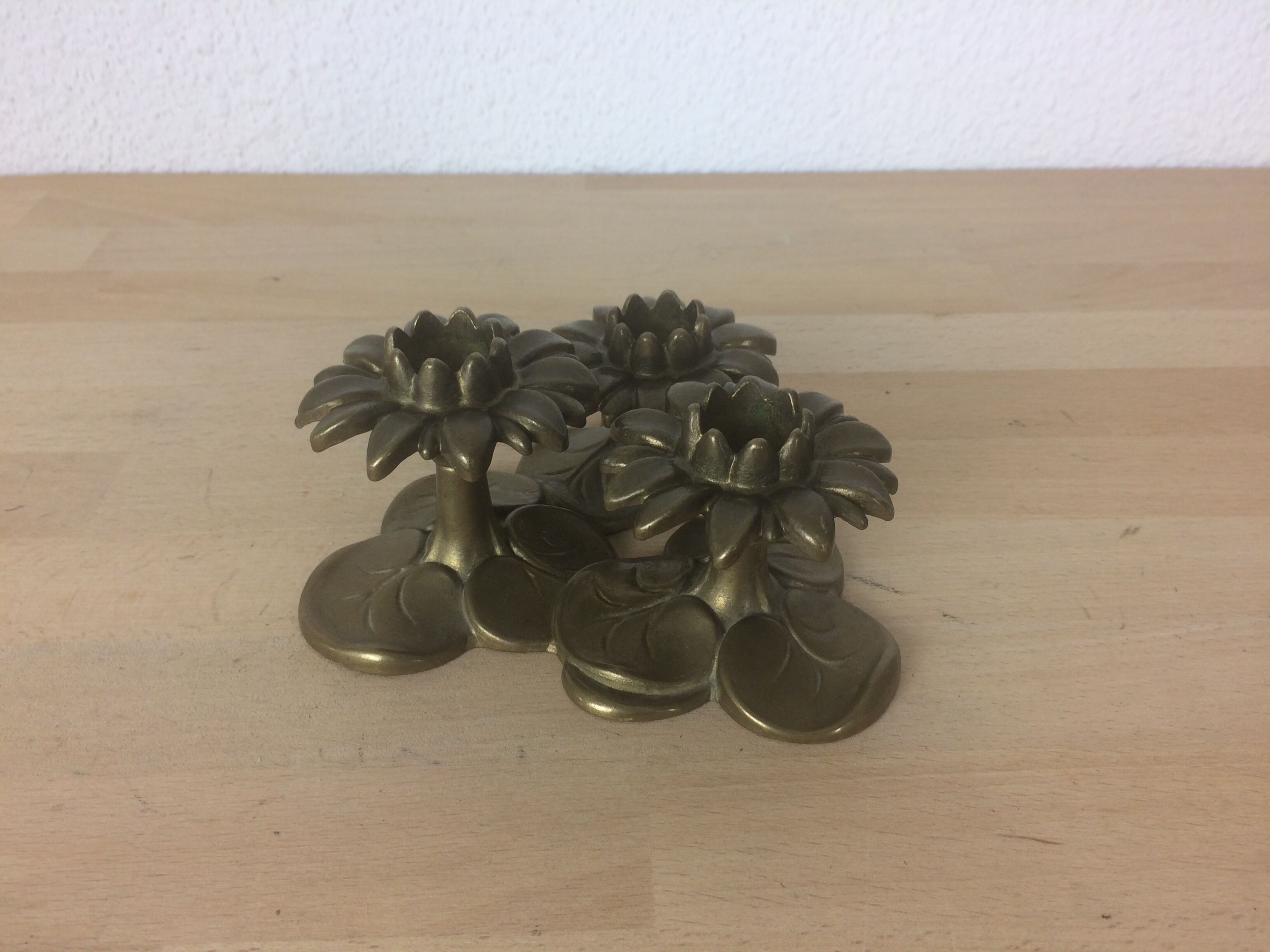 Triple brass flower candlestick