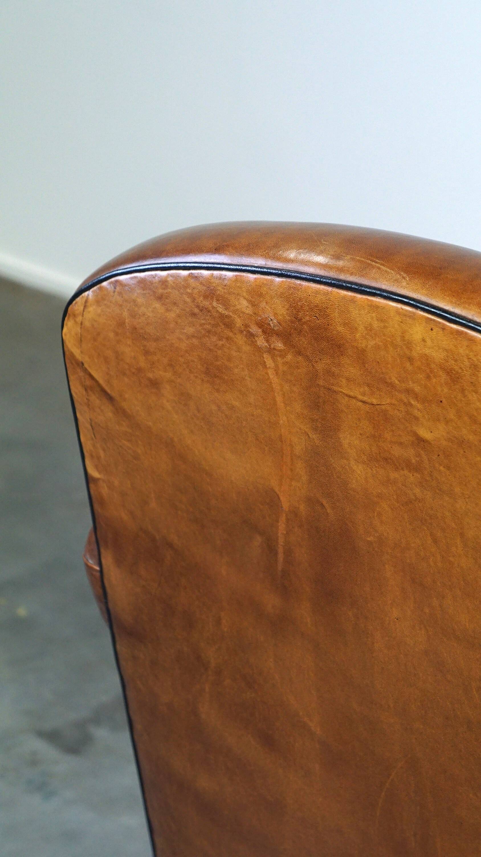 Vintage sheep leather armchair/design armchair with a beautiful look