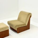 Vintage mid-century beige armchair with wooden frame and ottoman