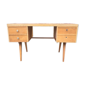 Vintage desk with compass feet with 4 drawers and tray in Formica faux wood way.
