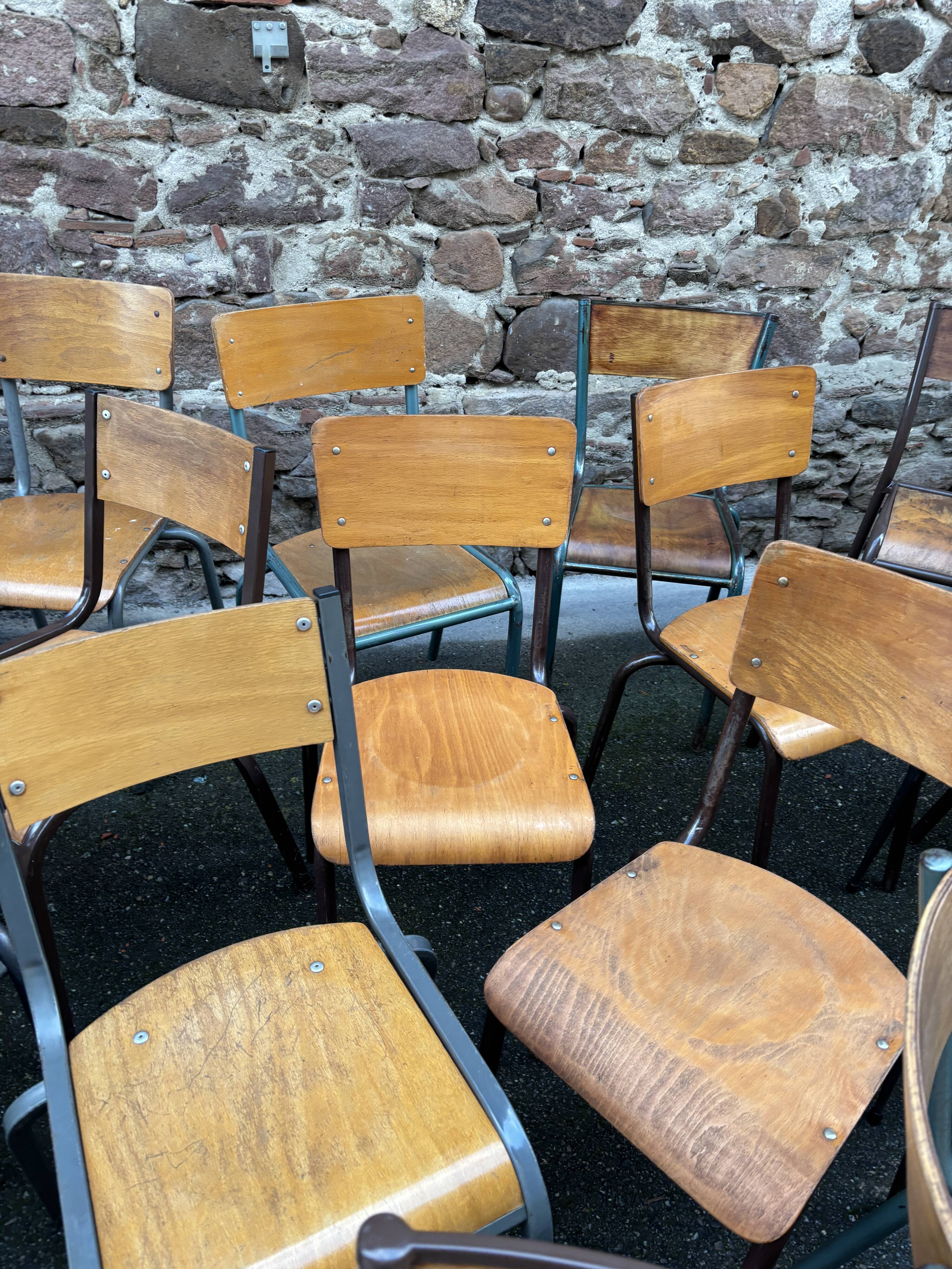 30 mismatched vintage industrial school chairs MULLCA tube & wood