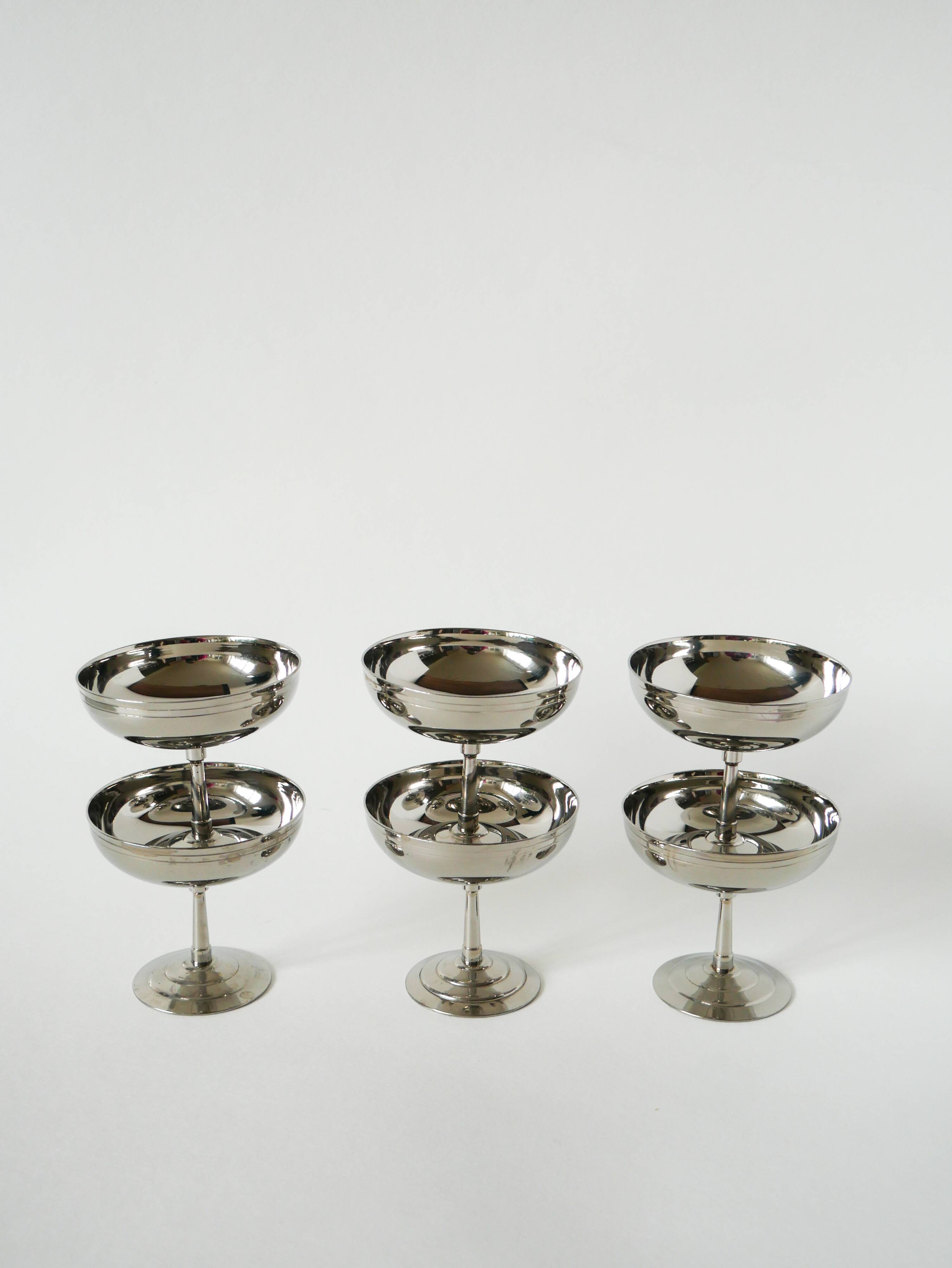 Set of 6 stainless steel bowls with fine feet, Design, 1970