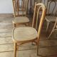 Raw wood bistro chairs.