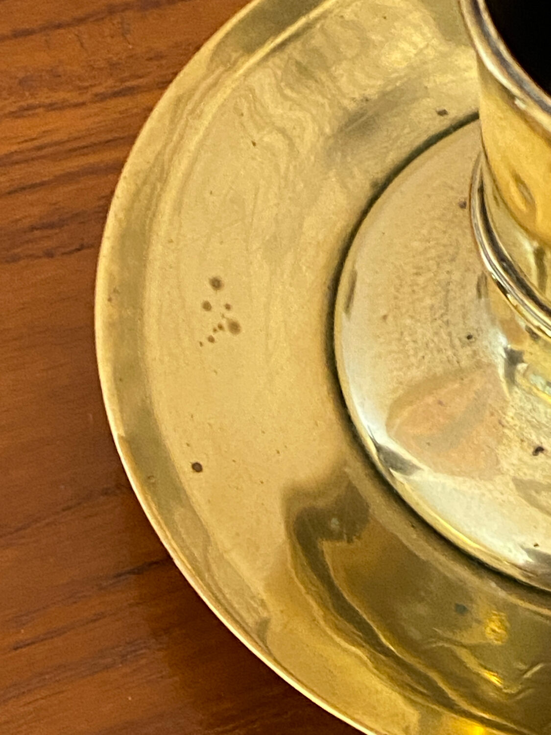 Compartmentalised brass candlestick