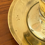 Compartmentalised brass candlestick