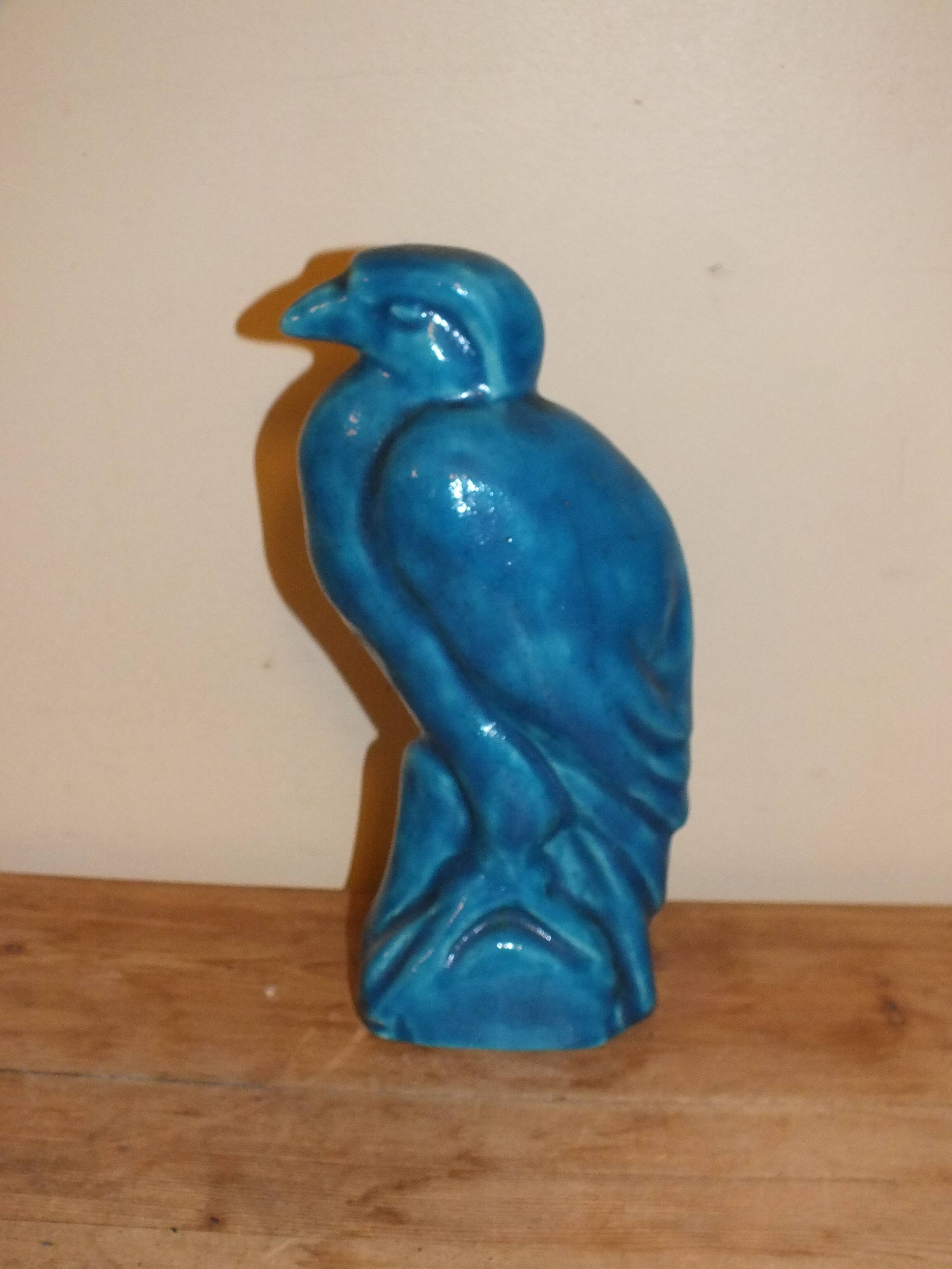 Bird, cracked blue raptor in ceramic