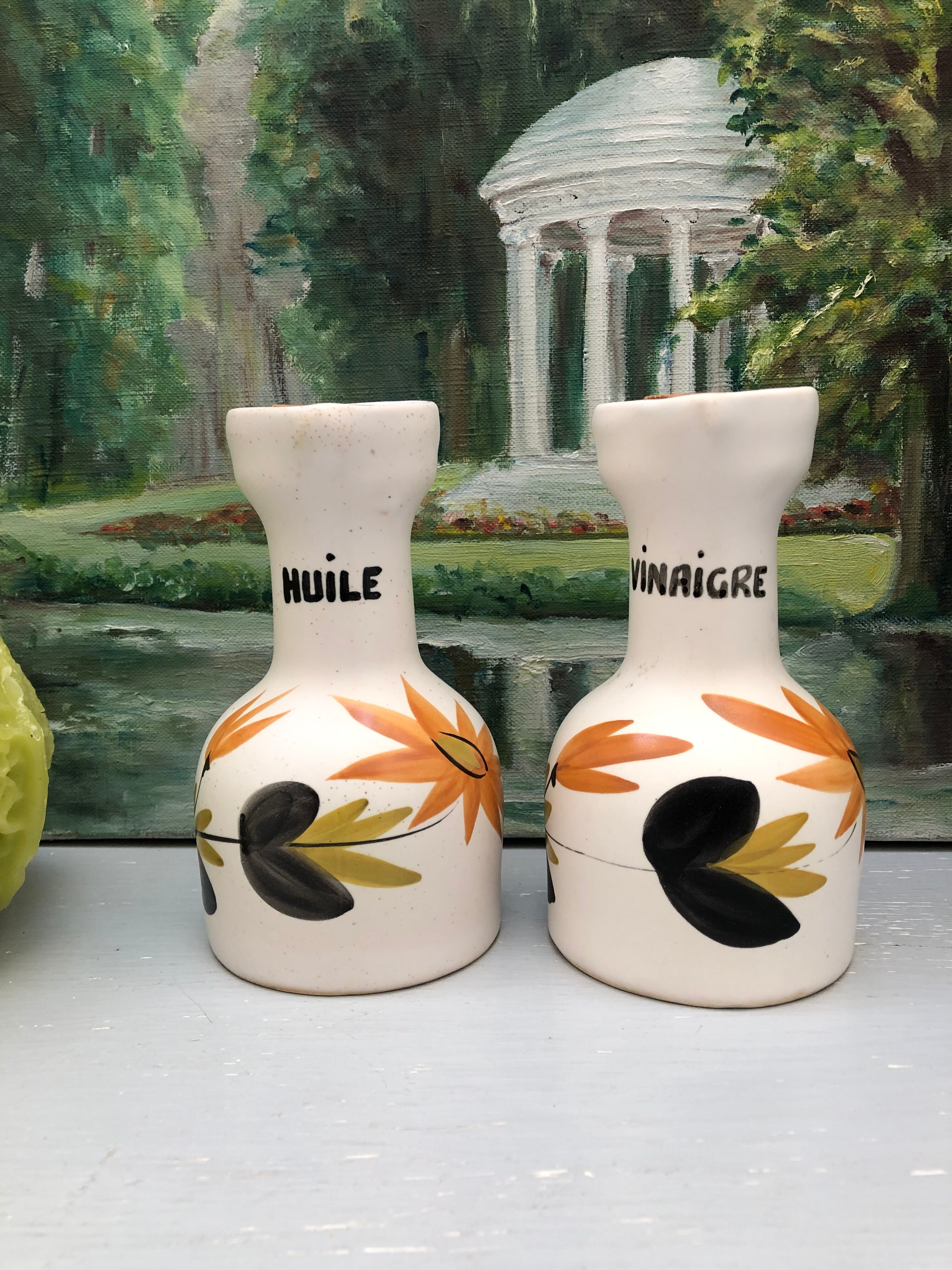 Old vinegar and oil maker with vintage decoration floral motifs