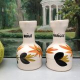 Old vinegar and oil maker with vintage decoration floral motifs