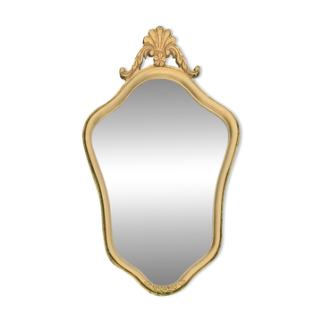 Antique beveled wall mirror in gilded solid wood