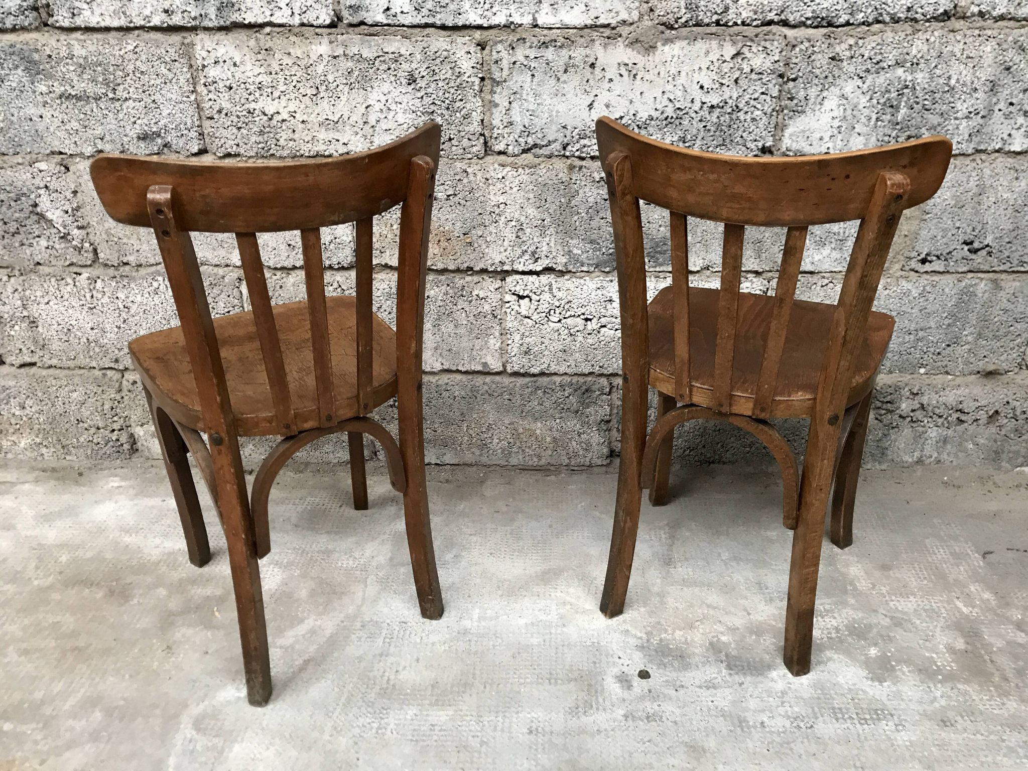Pair of bistro chairs troquet Parisien in curved wood 1950