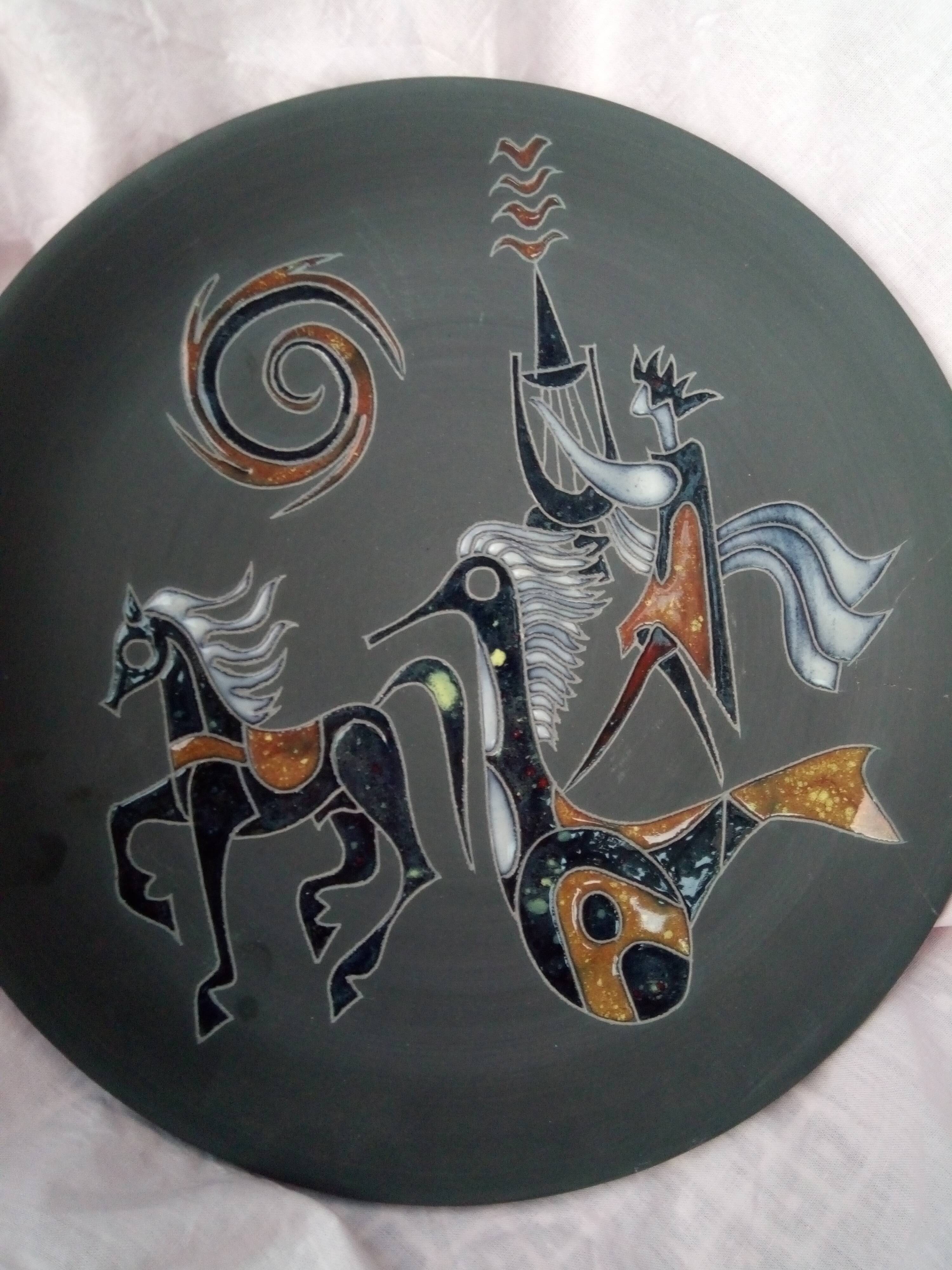 Rare pair of ceramic plates and enamel with mythological decoration. The 50s.