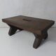 Old small wooden bench step in solid oak