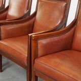 Majestic, luxurious set of 4 cognac-colored cowhide leather Art Deco design armchairs