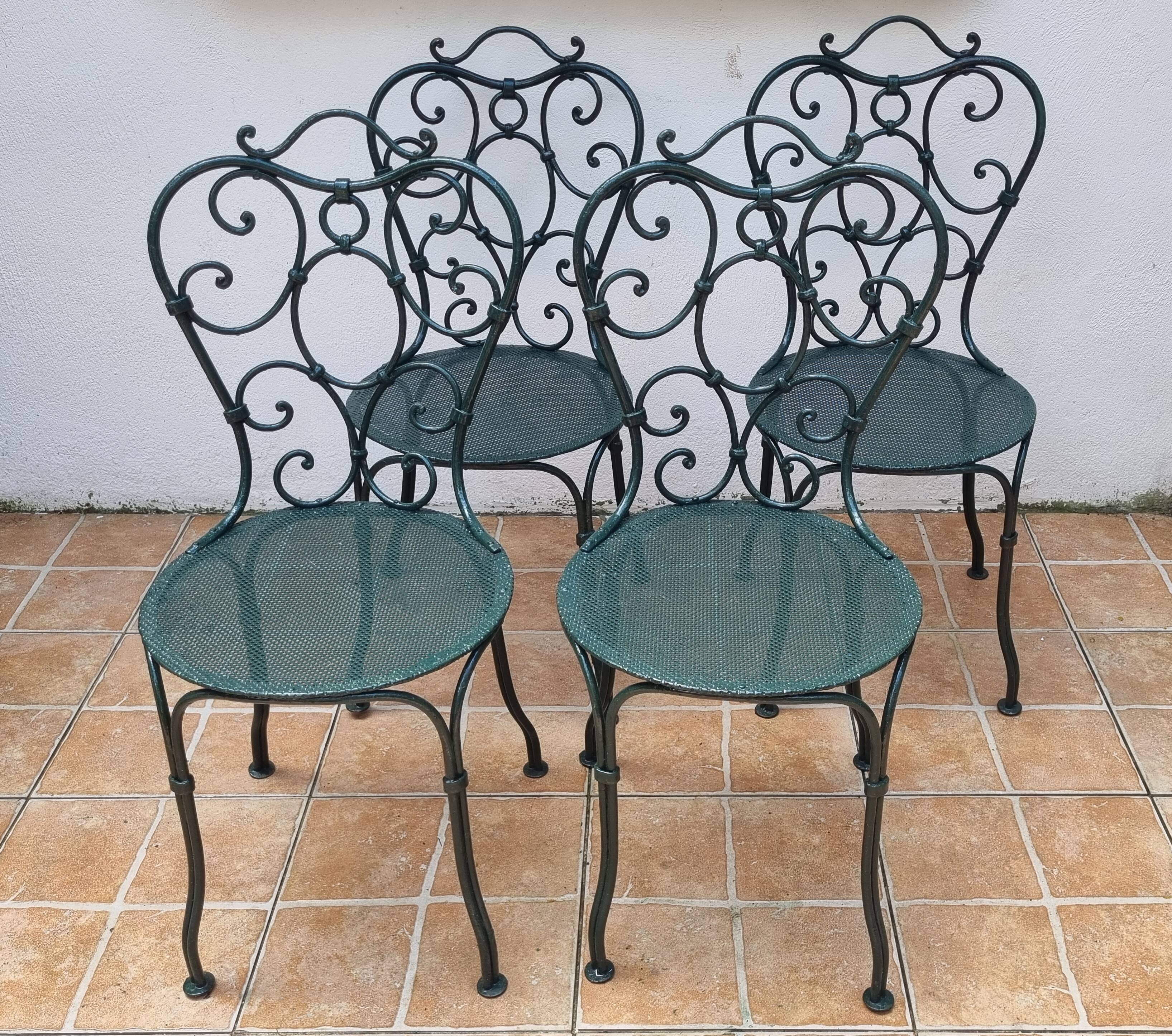 Set of 4 antique garden chairs in wrought iron from 1900.